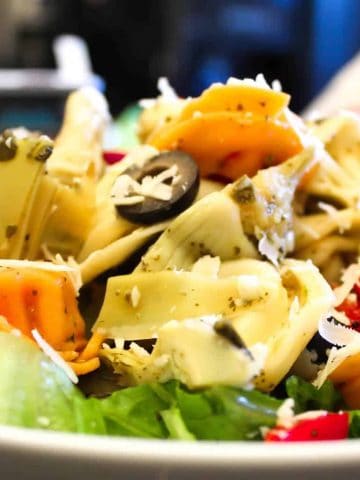 Tortellini Pasta Salad in a white bowl