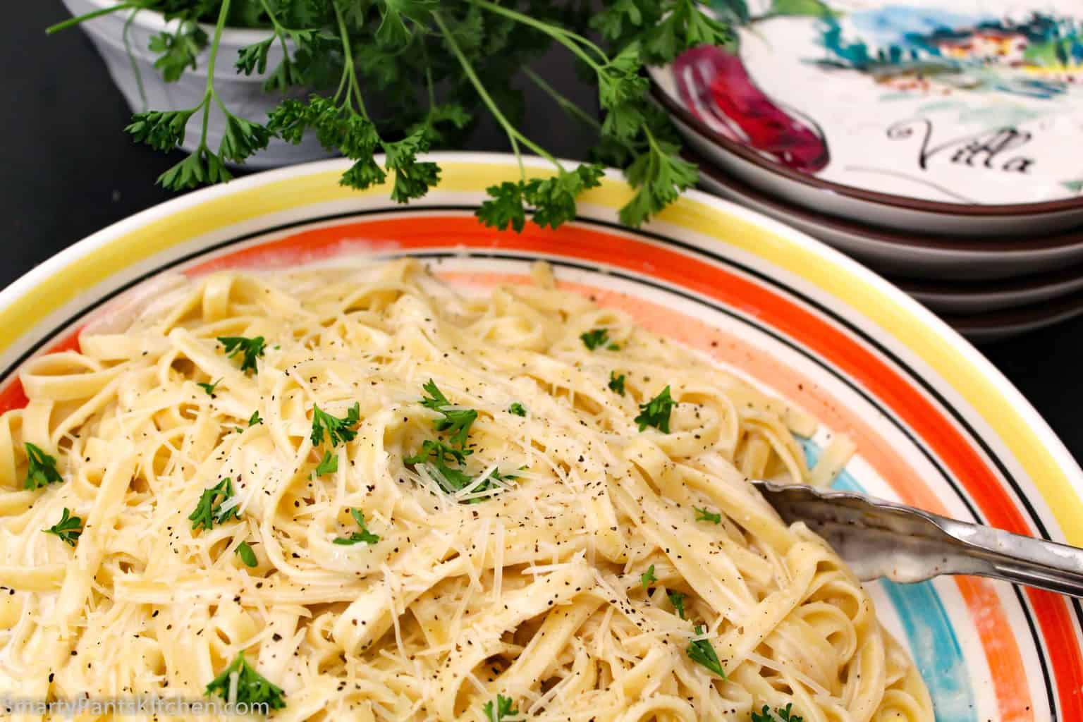 Fettuccine Alfredo in decorative bowl.