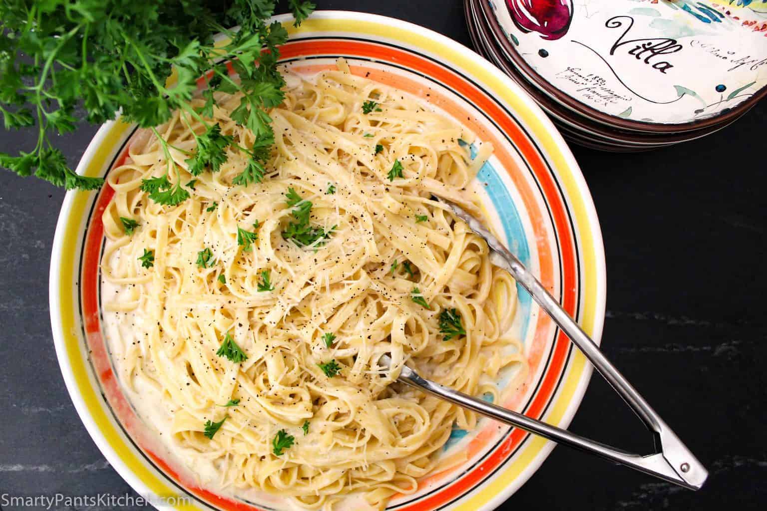 Fettuccine Alfredo in decorative bowl.