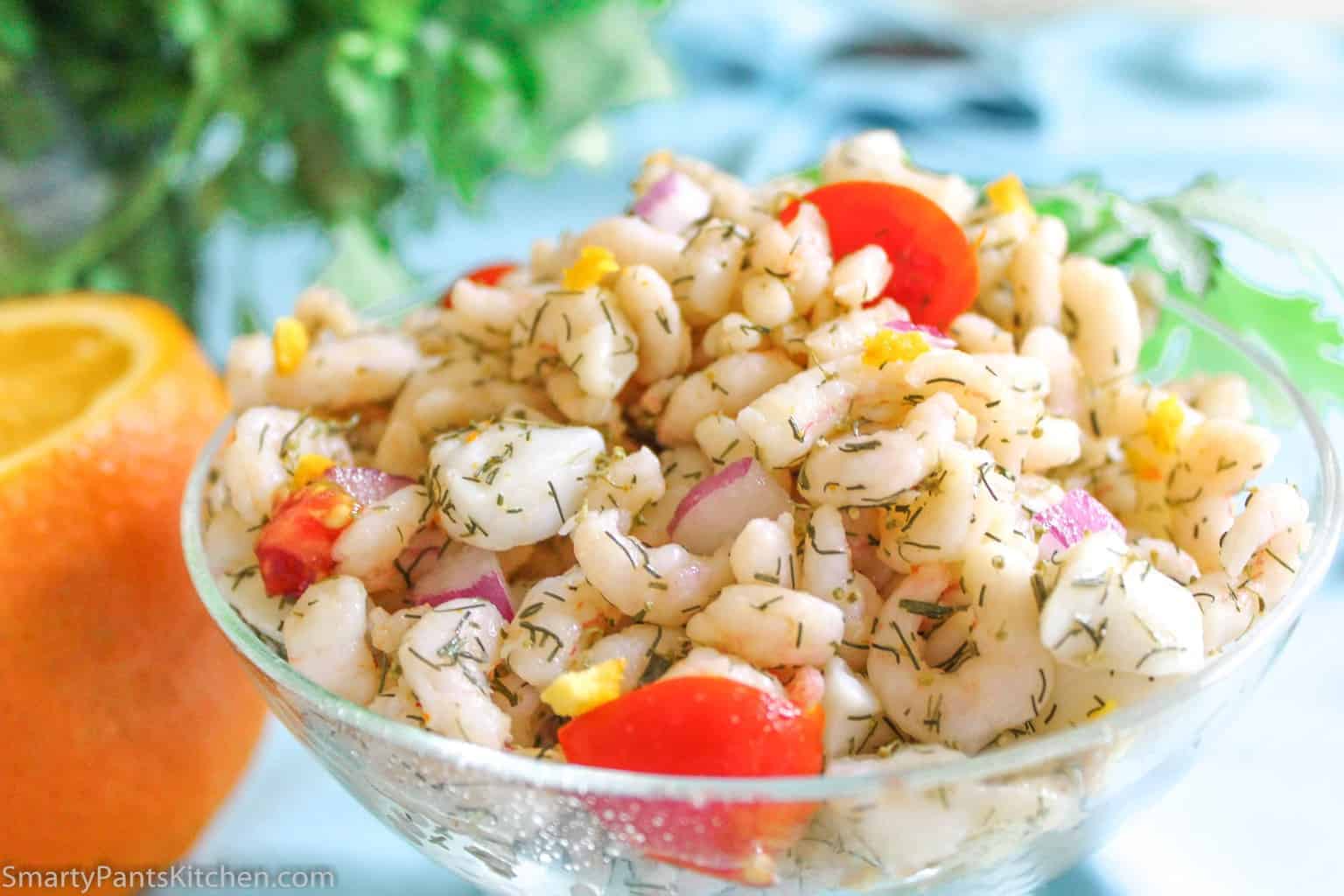 Orange Shrimp and scallop ceviche in glass bowl