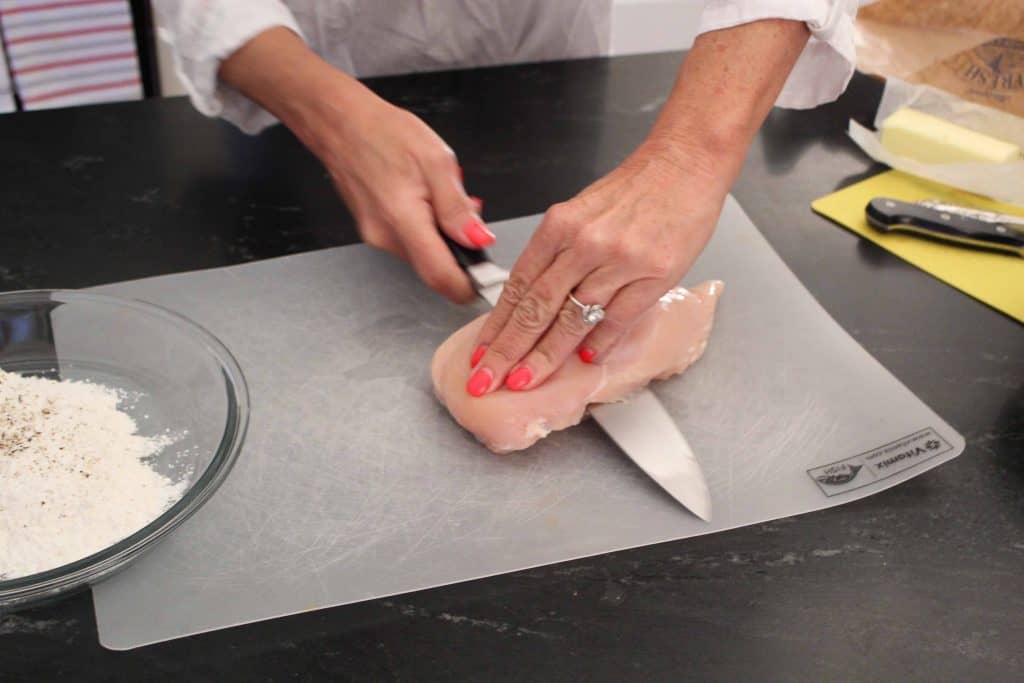 Slice chicken breast in half lengthwise for chicken piccata