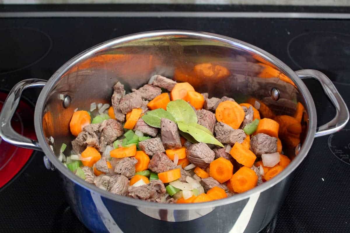 Vegetables Beef and Bay Leaves in stockpot for beef stew