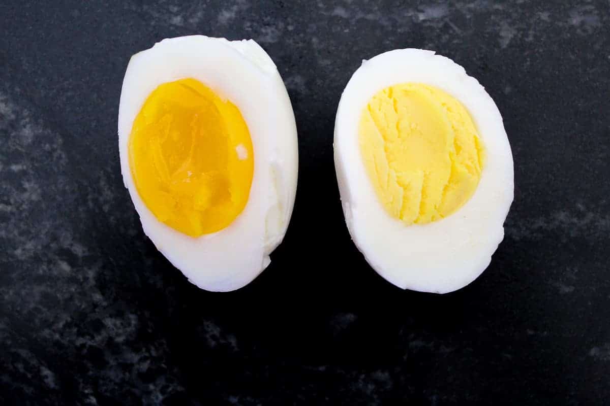 Comparison of hard and soft boiled eggs cut in half