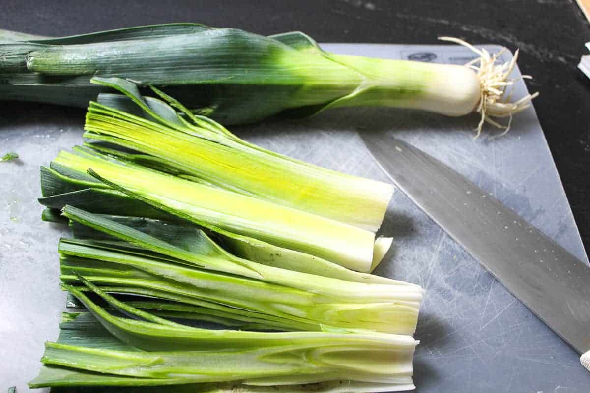 4 images showing how to clean leeks.