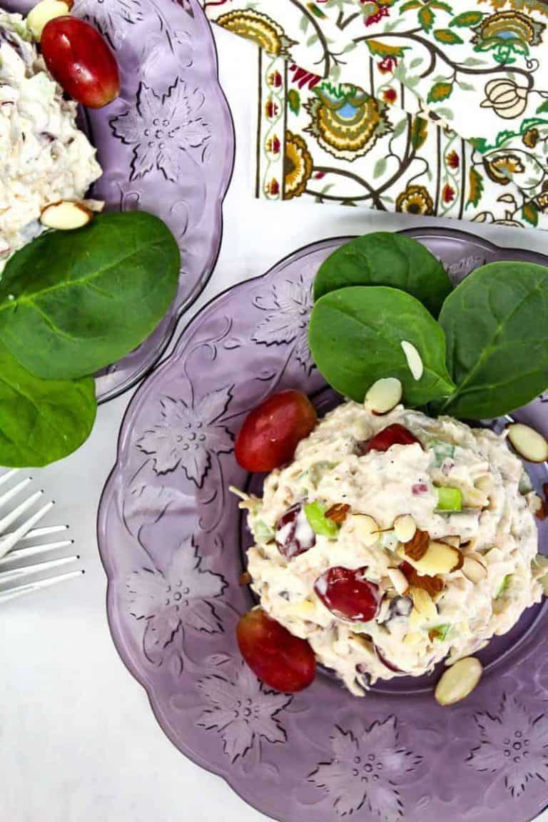 Turkey salad on purple plate.