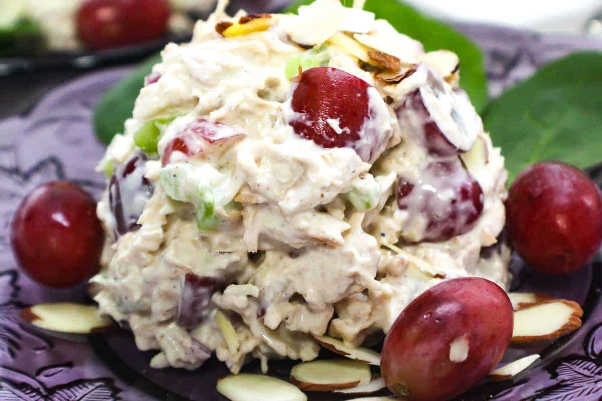 A big scoop of leftover smoked turkey salad with red grapes and celery