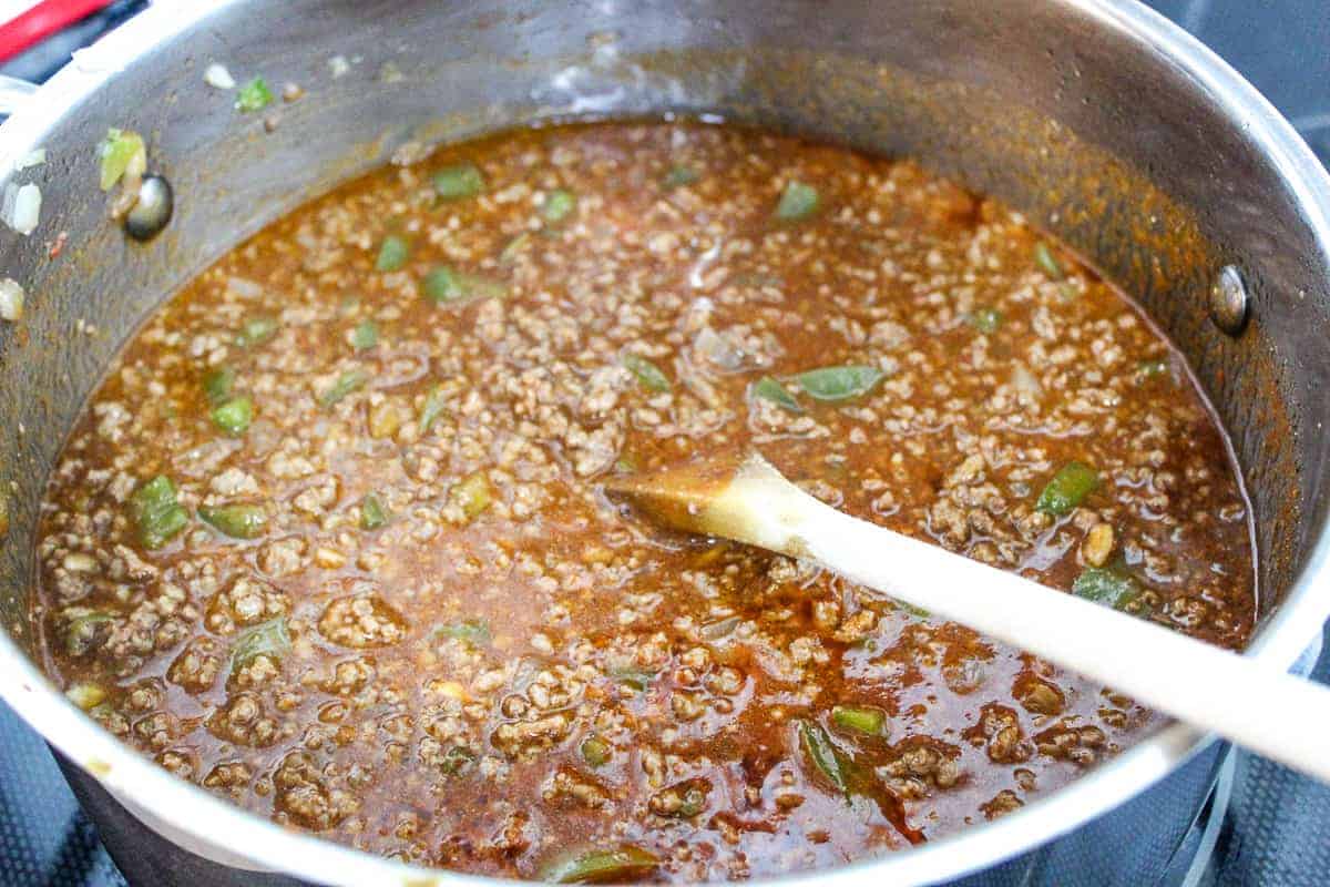 Goulash in stockpot with liquid.