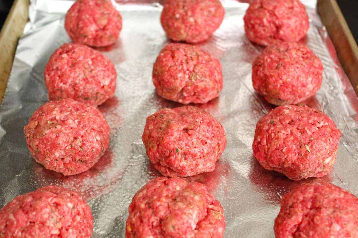 Meatballs on a foil lined baking sheet