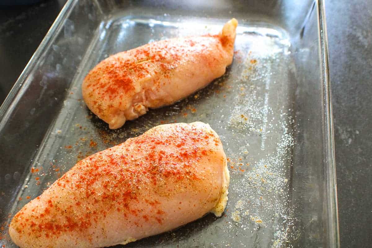 Seasoned chicken in baking dish