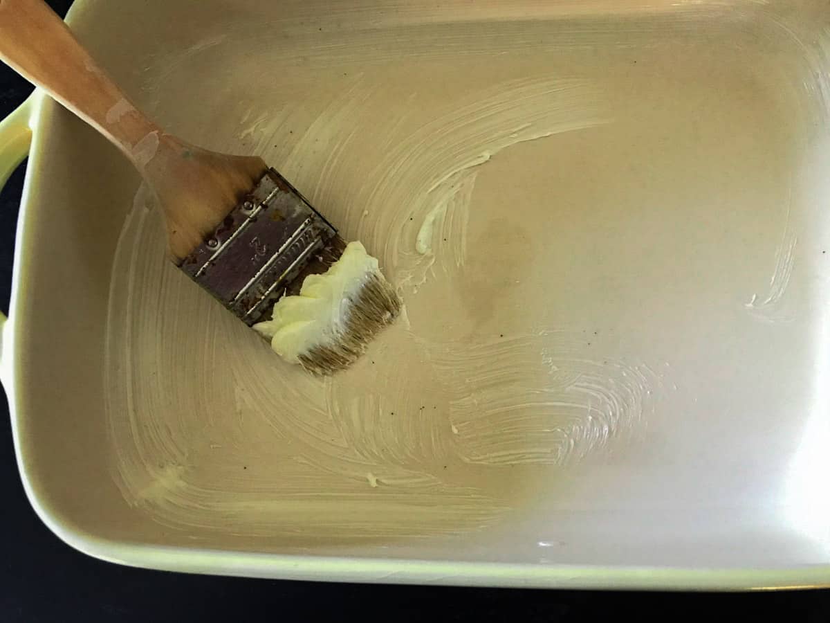 Brush butter onto baking dish