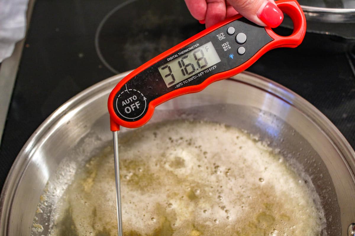 Meat thermometer in oil reading 316&ordm;F 