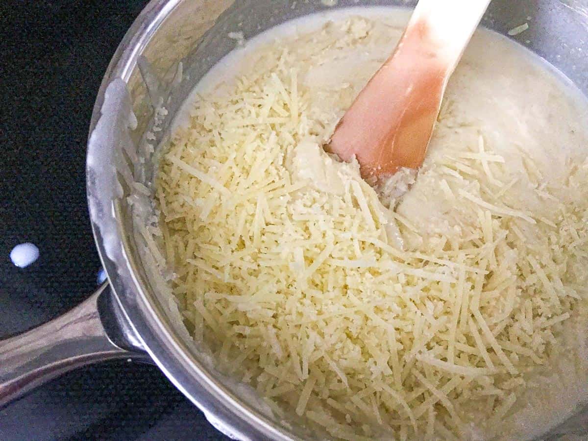 Parmesan cheese in saucepan