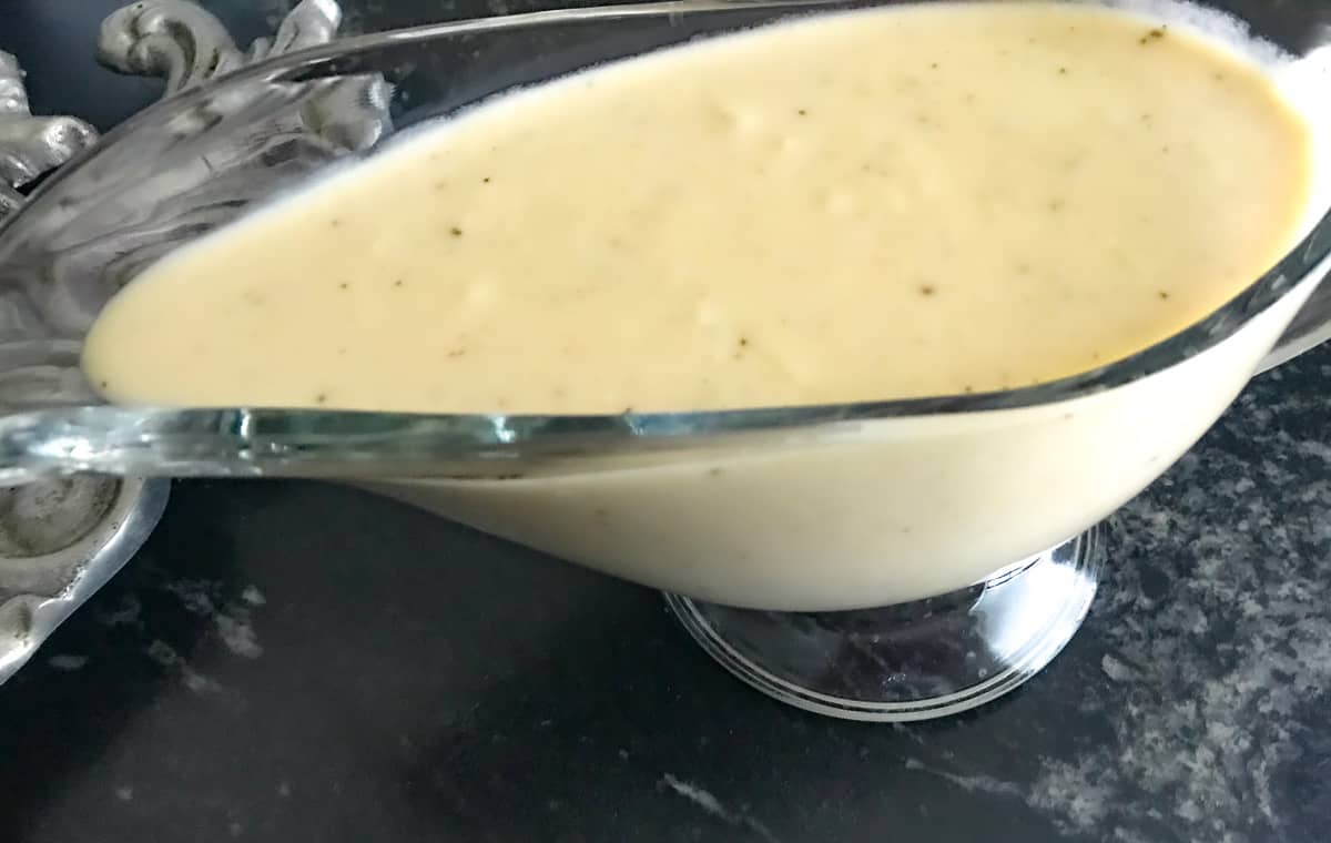 Dijon sauce in a clear gravy boat