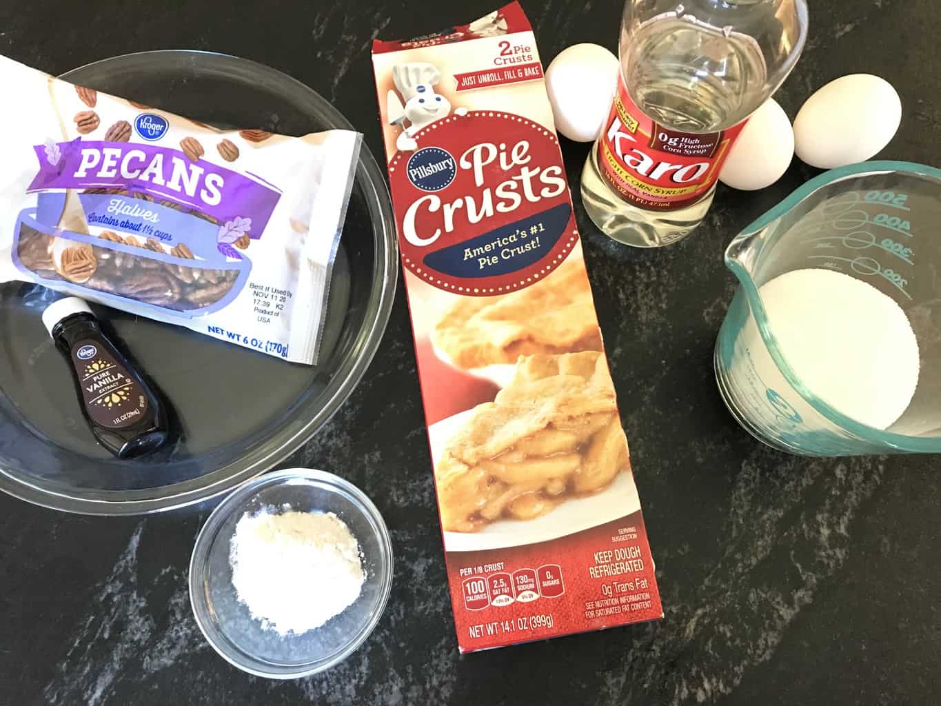 Ingredients for pecan pie on countertop