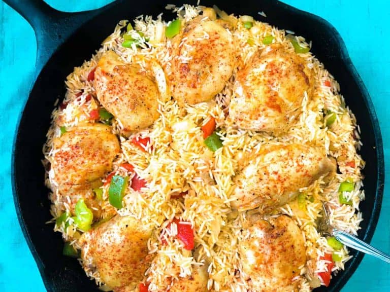 Smoked Paprika Chicken in cast iron skilletwith Basmati Rice in Pan