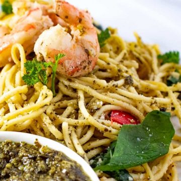 Close up of shrimp and pasta with pesto