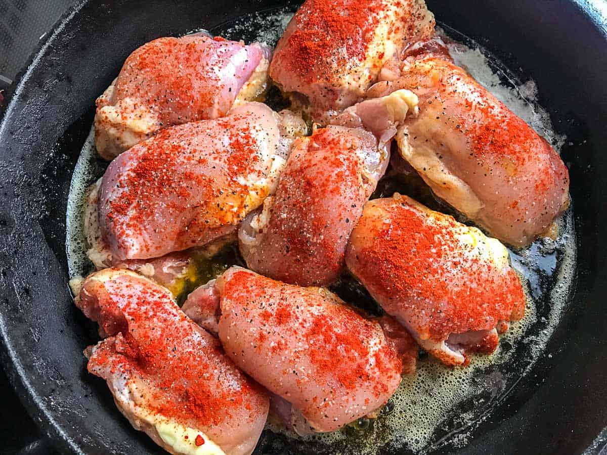 Chicken thighs with smoked paprika in pan