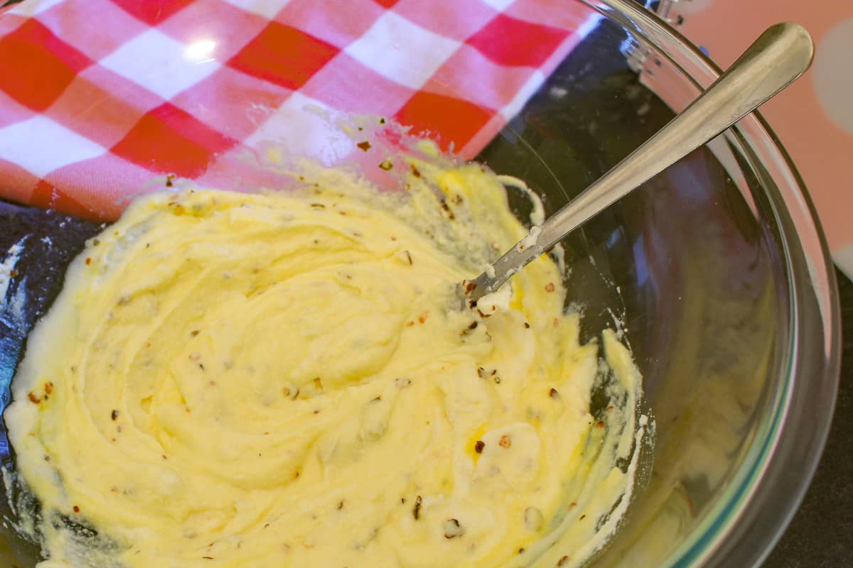 Ricotta cheese and eggs in bowl with fork