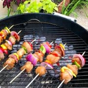 Chicken and vegetable kabobs on grill