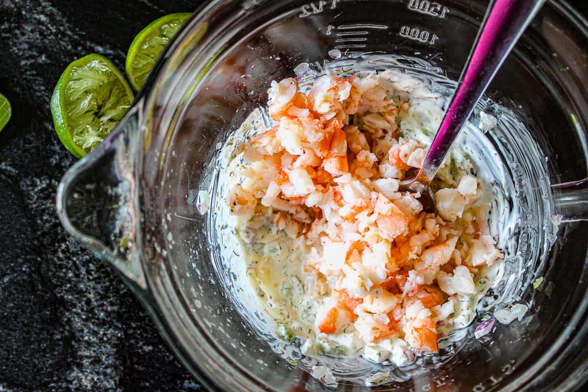 Chopped shrimp in bowl with ingredients