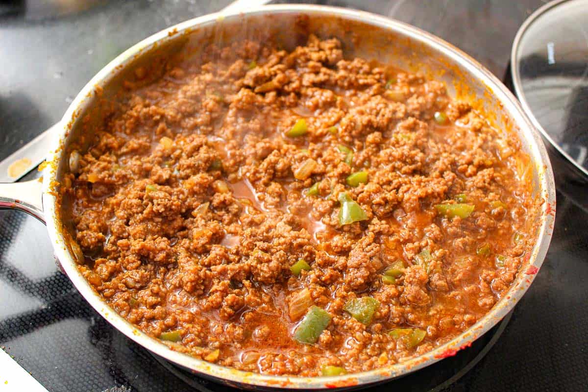 Ground beef for sloppy joe in skillet on stove