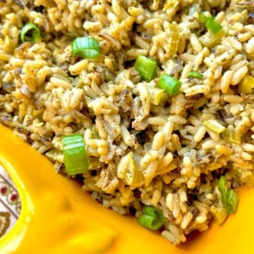 Wild Rice and Oyster Dressing in a yellow serving dish