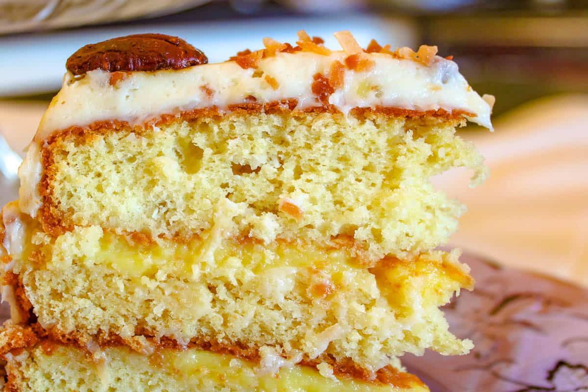 Close up of a slice of Orange Italian Cream Cake