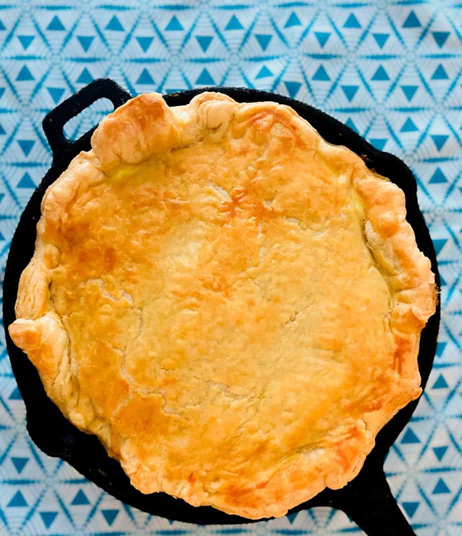 Spinach Feta Pie in Puff Pastry in cast iron skillet.