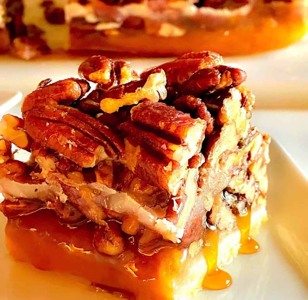 Square cut of Texas Pecan bar on a white plate