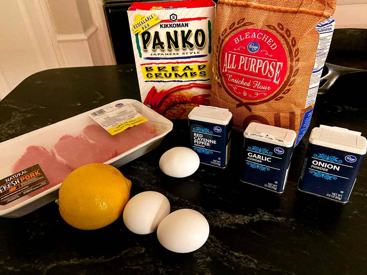 Pork Schnitzel ingredients on counter.