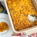 Eggplant casserole in white baking dish.