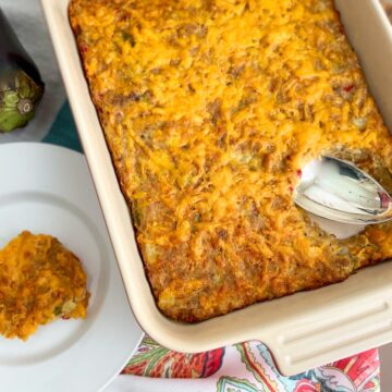 Eggplant casserole in white baking dish.