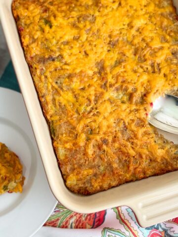 Eggplant casserole in white baking dish.