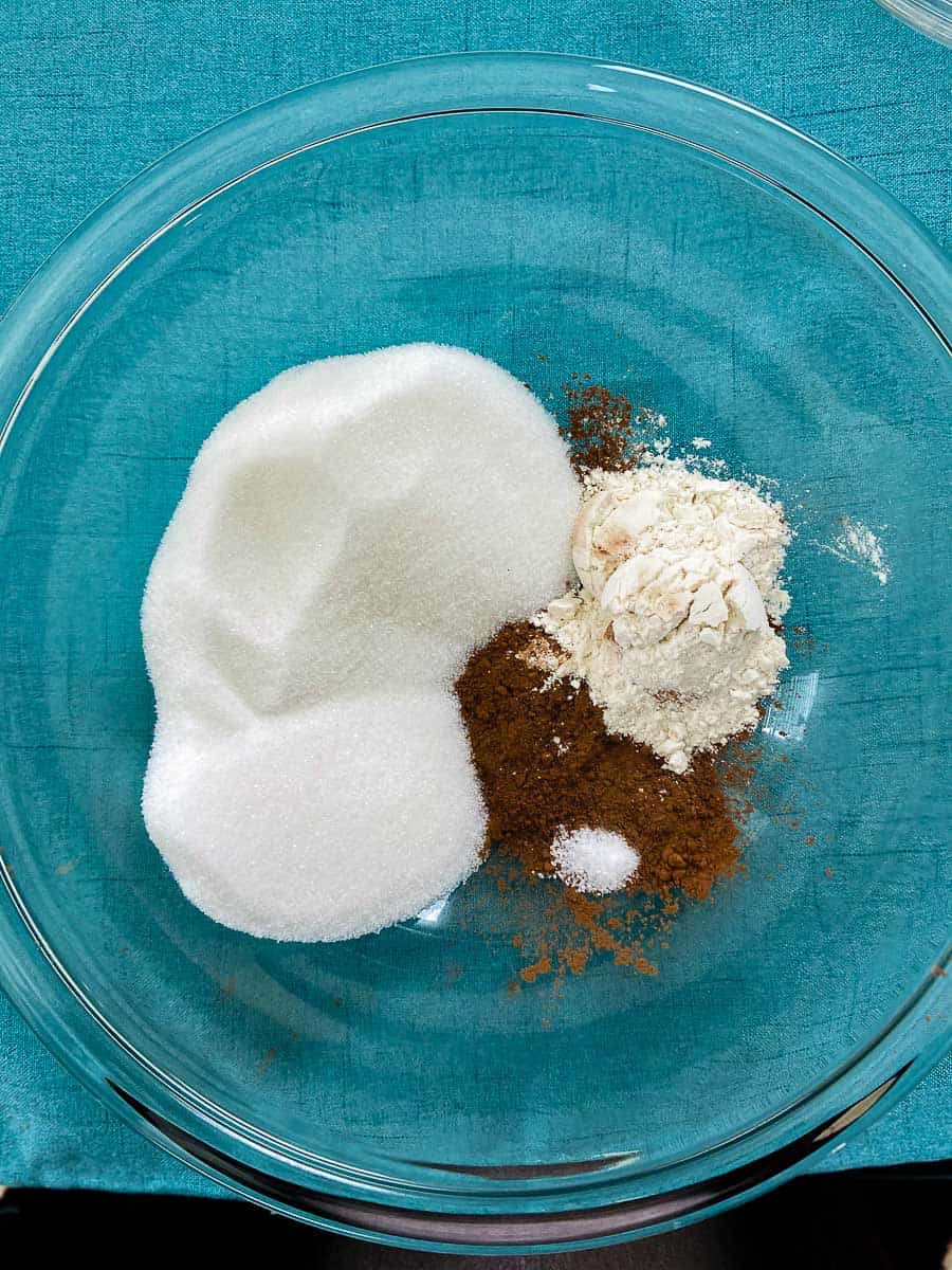 Sugar, cocoa, flour and salt in glass bowl