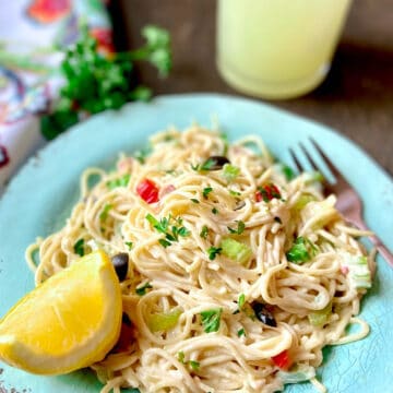 Vermicelli Salad on turquoise plate garnished with lemon wedge