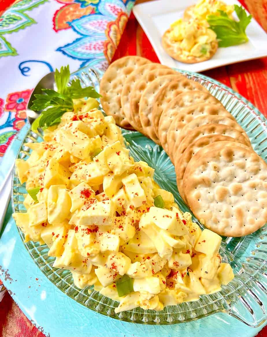 Egg Salad on plate with crackers.