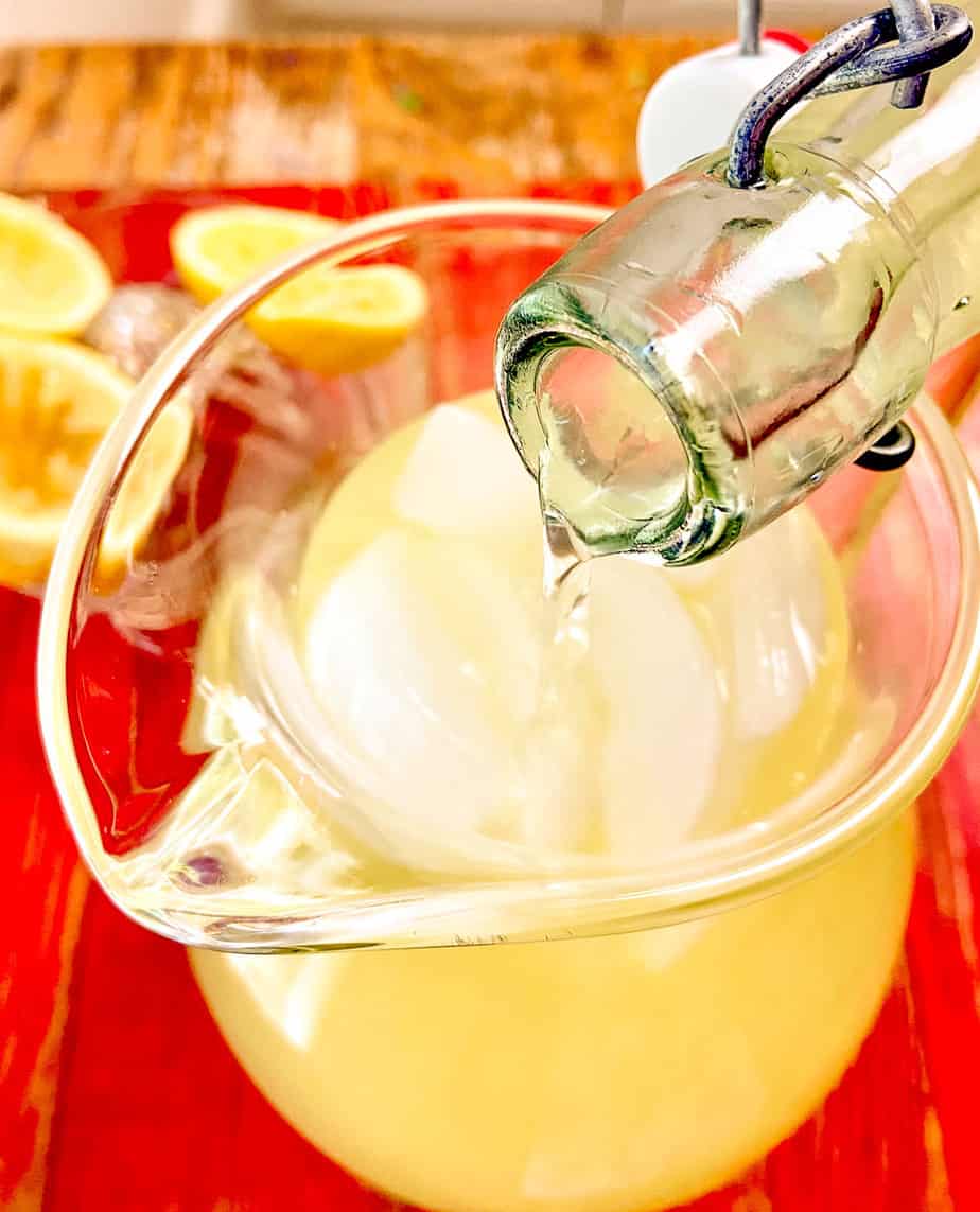 Water being poured into pitcher.