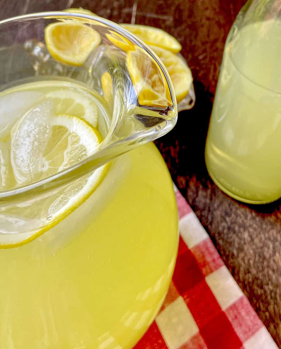 Homemade lemonade in pitcher with ice.