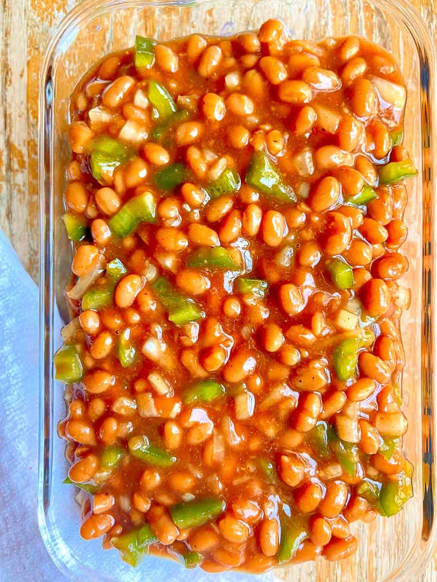 Maple baked beans in a baking dish.