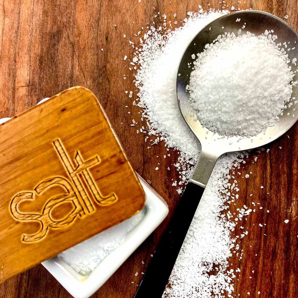 Salt on a spoon.