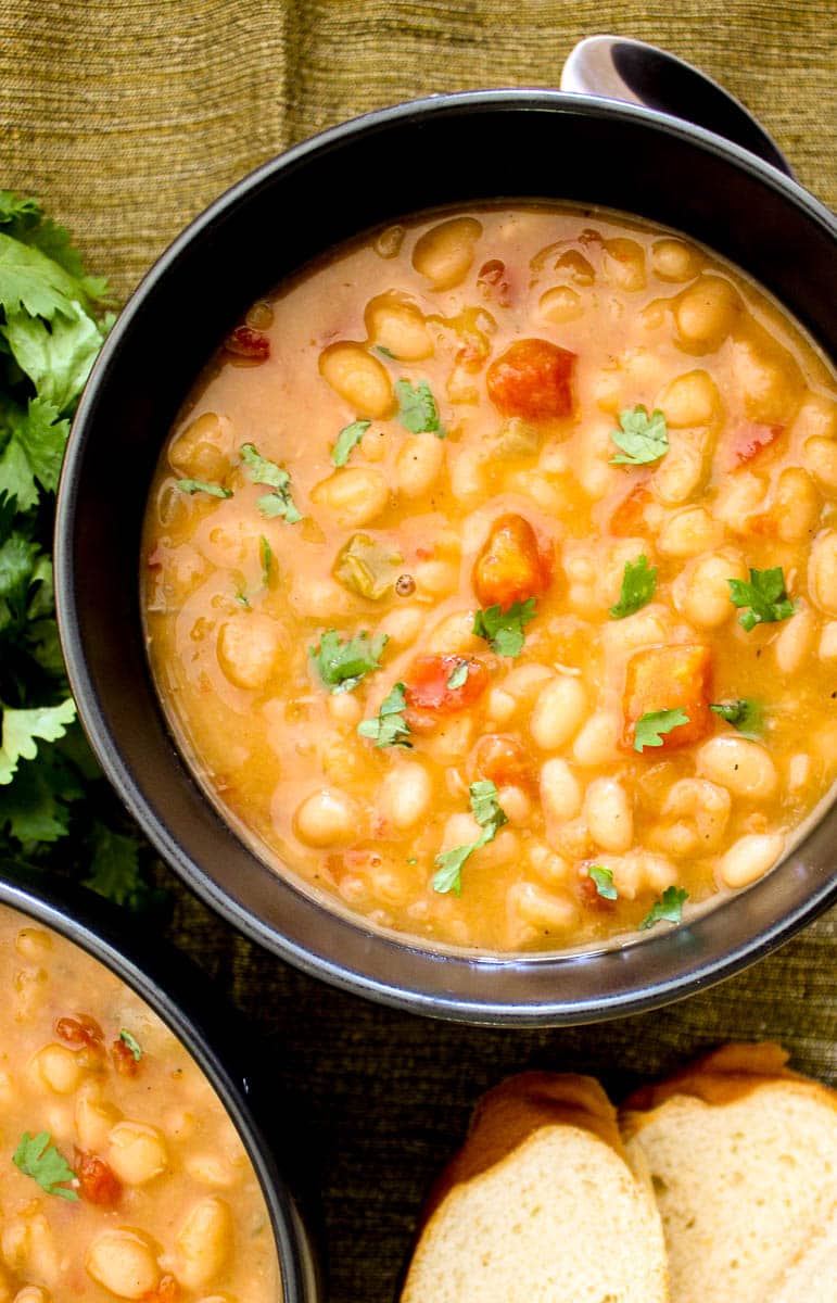 Southwestern Navy Bean soup in black bowl.