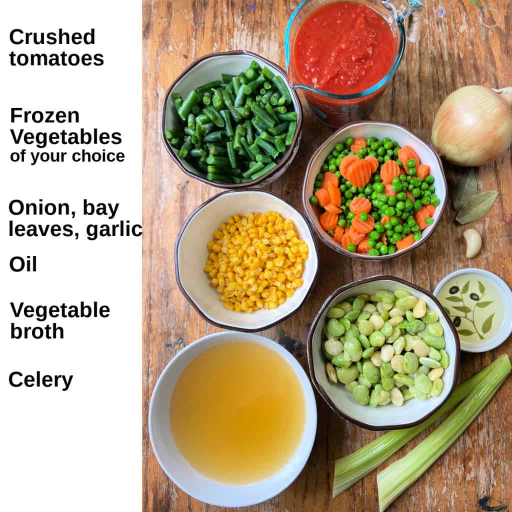 Vegetable soup ingredients labeled on counter.