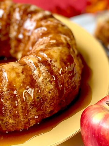 Apple cake on gold plate.