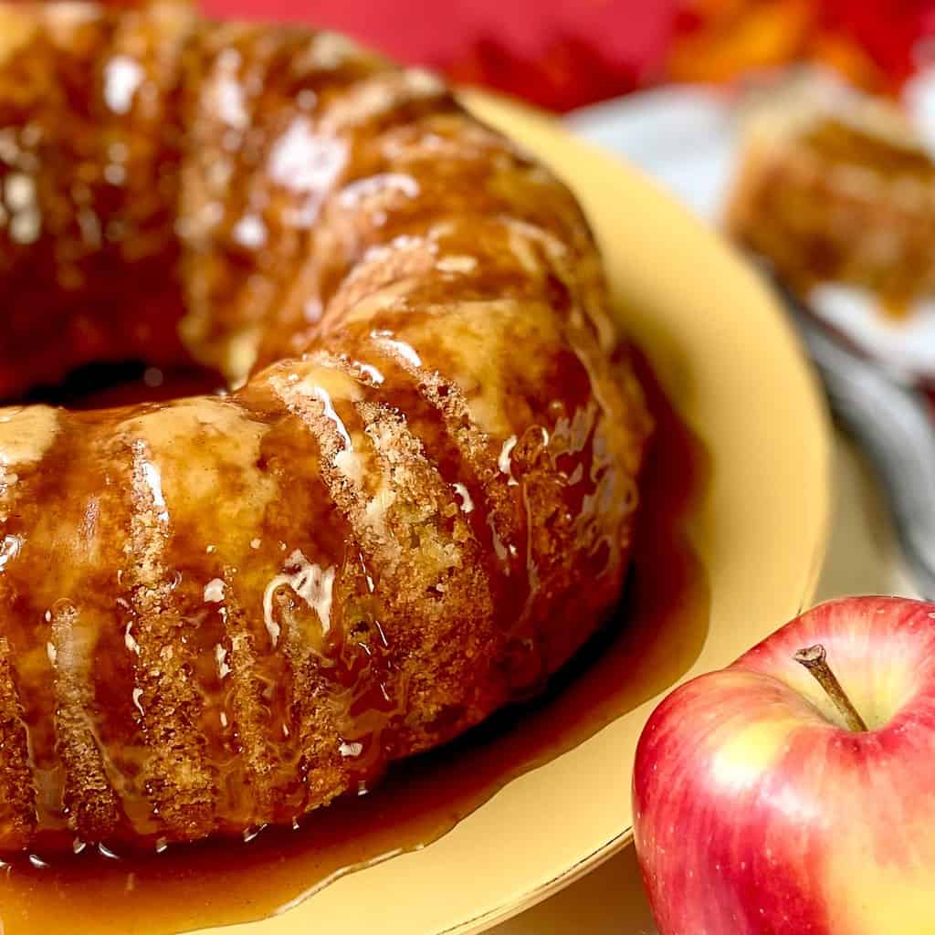 Apple cake on gold plate.