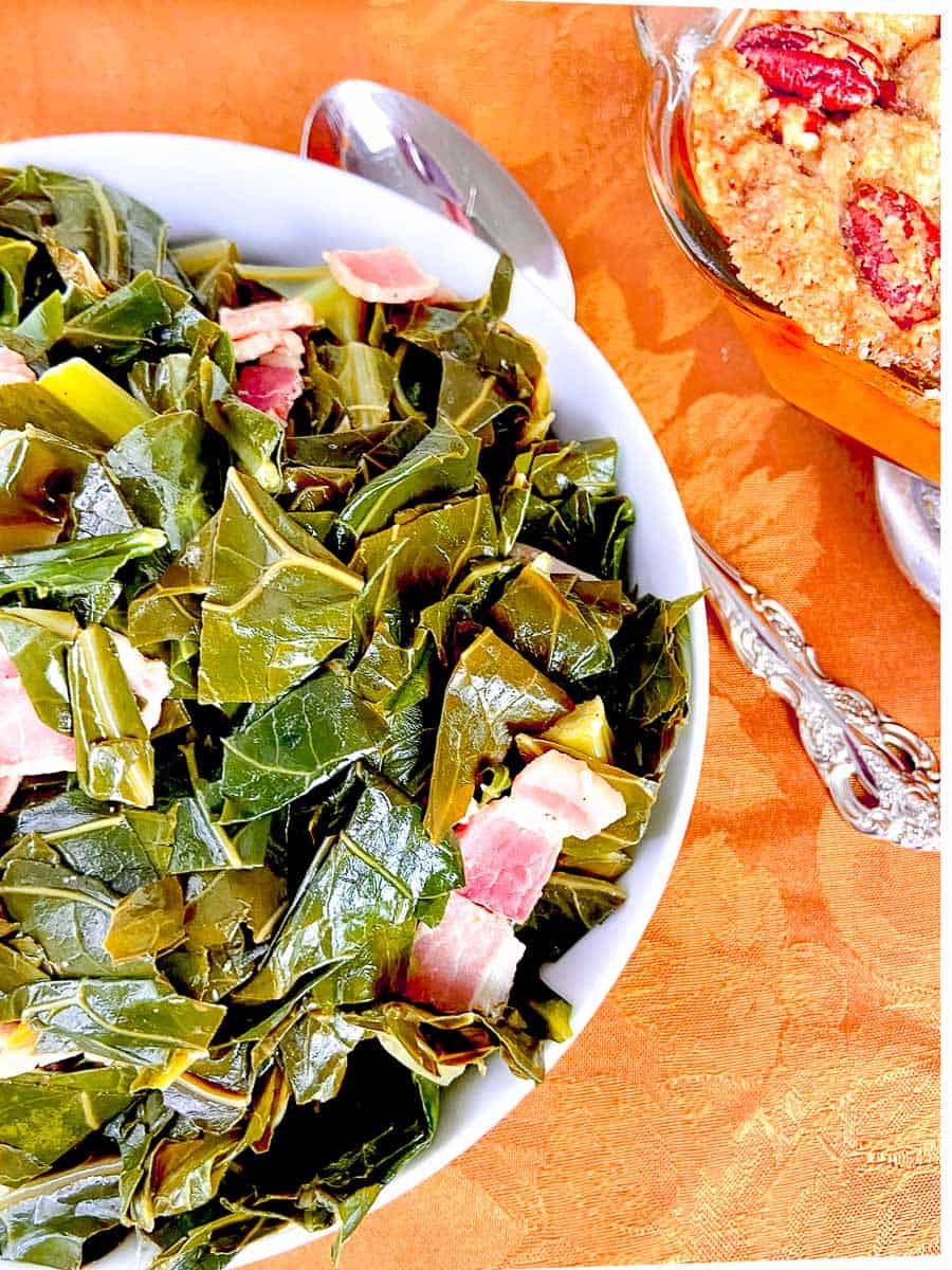 Seasoned greens in a white bowl.