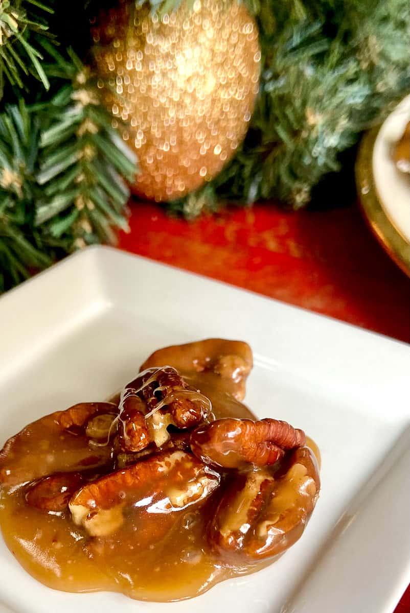 Pecan praline on plate.