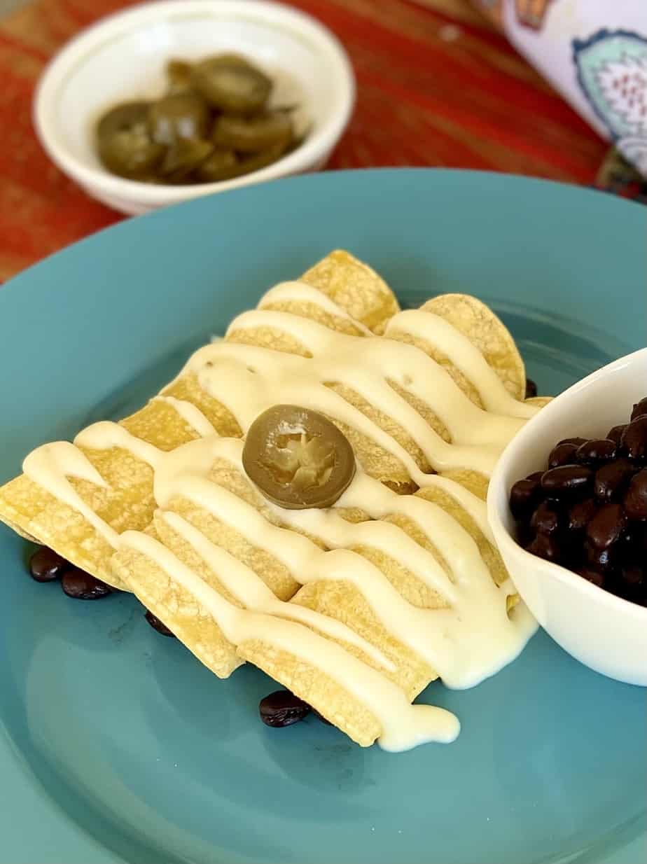 Sour Cream sauce on enchiladas.
