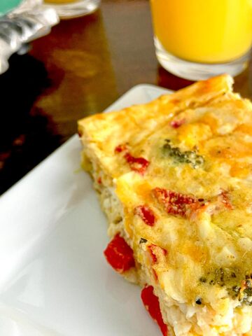 Slice of low carb egg casserole on plate.