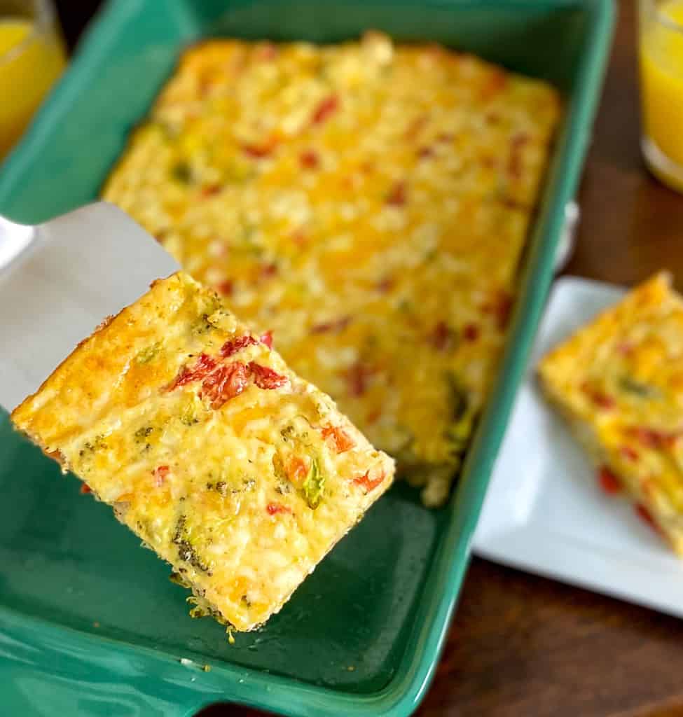 Slice of low carb breakfast casserole on serving spatula.