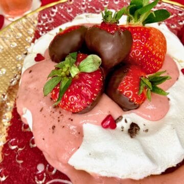 Pavlova with Strawberry curd and chocolate dipped strawberries.